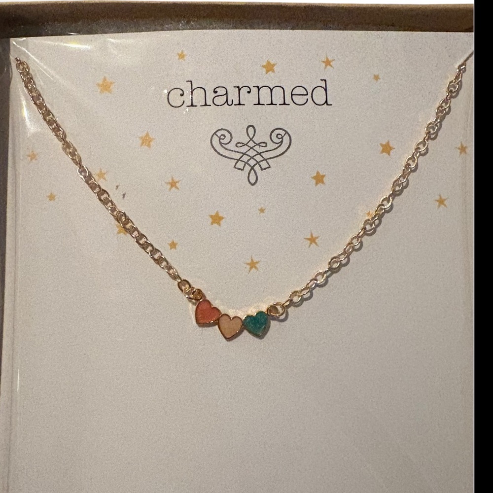 NWT triple heart necklace on gold chain